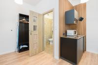 Kuchnia lub aneks kuchenny w obiekcie Kwiatowa Apartments Poznań City Center by Noclegi Renters
