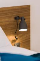 Łóżko lub łóżka w pokoju w obiekcie Kwiatowa Apartments Poznań City Center by Noclegi Renters
