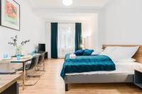 Łóżko lub łóżka w pokoju w obiekcie Kwiatowa Apartments Poznań City Center by Noclegi Renters