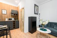 Kuchnia lub aneks kuchenny w obiekcie Kwiatowa Apartments Poznań City Center by Noclegi Renters