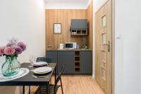 Kuchnia lub aneks kuchenny w obiekcie Kwiatowa Apartments Poznań City Center by Noclegi Renters