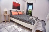 Posteľ alebo postele v izbe v ubytovaní Villa The Cosy Olive