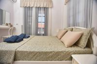 Posteľ alebo postele v izbe v ubytovaní Villa The Cosy Olive