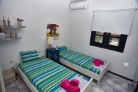 Posteľ alebo postele v izbe v ubytovaní Villa The Cosy Olive