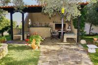Vonkajšia záhrada v ubytovaní Villa The Cosy Olive