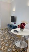 A television and/or entertainment centre at Vintage Ottaviano Apartment