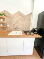 Kuchyň nebo kuchyňský kout v ubytování Esplanada-Zona Central-Perto Praias-Estacionamento Gratuito