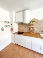Kuchyň nebo kuchyňský kout v ubytování Esplanada-Zona Central-Perto Praias-Estacionamento Gratuito
