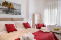 Posteľ alebo postele v izbe v ubytovaní La Preziosa Apartment