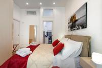 Posteľ alebo postele v izbe v ubytovaní La Preziosa Apartment