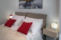 Posteľ alebo postele v izbe v ubytovaní La Preziosa Apartment