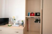Televízia a/alebo spoločenská miestnosť v ubytovaní La Preziosa Apartment