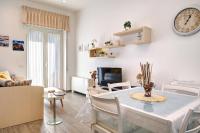 Televízia a/alebo spoločenská miestnosť v ubytovaní La Preziosa Apartment