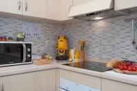 Kuchyňa alebo kuchynka v ubytovaní La Preziosa Apartment