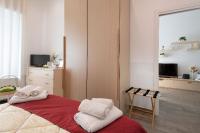 Posteľ alebo postele v izbe v ubytovaní La Preziosa Apartment