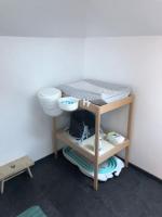 Łóżko lub łóżka w pokoju w obiekcie La maison d’à côté