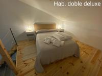Postel nebo postele na pokoji v ubytování Casa Sergio