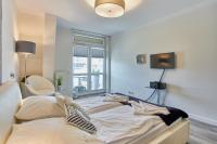 Posteľ alebo postele v izbe v ubytovaní Villa Mistral by Baltic Home