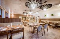Reštaurácia alebo iné gastronomické zariadenie v ubytovaní MAYER - Wirtshaus und Dorfhotel