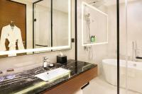 Koupelna v ubytování Asiana Grand Hotel