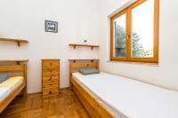 Postel nebo postele na pokoji v ubytování Apartments Jonke