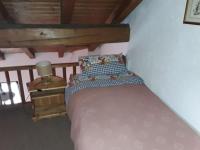 A bed or beds in a room at Tana della volpe 1