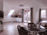 TV a/nebo společenská místnost v ubytování Dali Apartment Szentendre