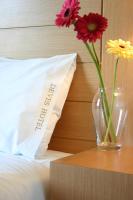 Posteľ alebo postele v izbe v ubytovaní Deves Hotel