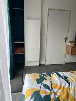 Łóżko lub łóżka w pokoju w obiekcie Blu'in - Mérignies