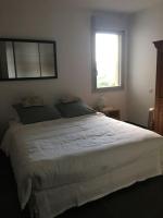 Posteľ alebo postele v izbe v ubytovaní Appartement T3 à 2mn de la Plage