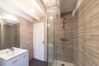 a bathroom with a shower and a sink at AR PENNITI - Magnifique maison en pierre proche plage in Landéda