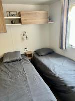 Posteľ alebo postele v izbe v ubytovaní Mobile home Zen Siblu Fréjus