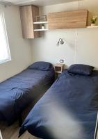 Posteľ alebo postele v izbe v ubytovaní Mobile home Zen Siblu Fréjus