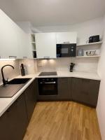 Kuchyň nebo kuchyňský kout v ubytování Apartma Pohorske terase Brumen Mariborsko Pohorje