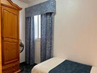 Postel nebo postele na pokoji v ubytování Apartamentos Dalia