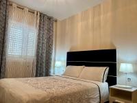 Postel nebo postele na pokoji v ubytování Apartamentos Dalia