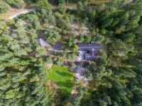 an aerial view of a house in the woods at Villa Mustikka in Ekenäs