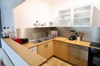 Kuchyňa alebo kuchynka v ubytovaní Bel apt 6 pers, 2 chambres avec balcon et parking