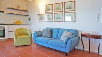 A seating area at Miralunga Villetta Gialla