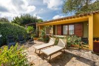 A garden outside Domus Carlotta Apartment with sea view Villasimius