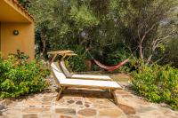 A garden outside Domus Carlotta Apartment with sea view Villasimius