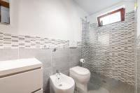 A bathroom at Domus Carlotta Apartment with sea view Villasimius