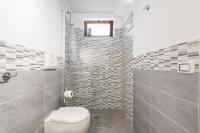 A bathroom at Domus Carlotta Apartment with sea view Villasimius