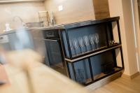 Kuchyňa alebo kuchynka v ubytovaní Gold Mandala Apartman Siófok By BLTN