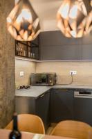 Kuchyňa alebo kuchynka v ubytovaní Gold Mandala Apartman Siófok By BLTN