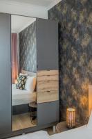 Posteľ alebo postele v izbe v ubytovaní Gold Mandala Apartman Siófok By BLTN
