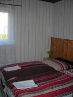 Posteľ alebo postele v izbe v ubytovaní Al Do Apartman