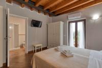 A bed or beds in a room at Cascina Volta