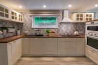 A kitchen or kitchenette at Chalet Ester - Luxury Provençal House in Orava