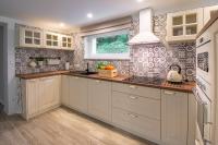 A kitchen or kitchenette at Chalet Ester - Luxury Provençal House in Orava